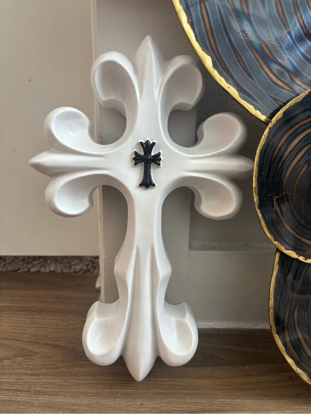 White Decorative Fleur Cross Wall Accent with Black Cross Detail